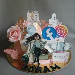 A fashion-forward cake for someone who loves brands, shopping, and social media. It's decorated with logos from Chanel, Gucci, Facebook, and Instagram.