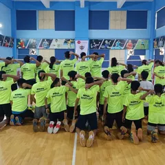 "Talent wins games, but teamwork and intelligence win championships." This photo from our 2022 summer camp captures the spirit of unity as the team poses together.