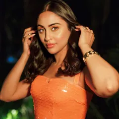 A closer look at Krystle's birthday glam. The makeup is blended to perfection, giving her a flawless glow that looks stunning in the evening light.