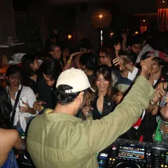 A view from my perspective at a packed club night. My arm is up, the crowd is vibing, and the energy is flowing. This is what a good night feels like.