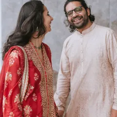 Another shot from the same series, capturing the easy, joyful chemistry between the newly engaged couple.