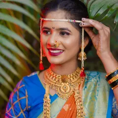 I believe every Maharashtrian bride is a work of art. In this portrait, I focused on the beautiful details of her look, from the traditional mundavalya and gold jewellery to her happy, confident smile. Creating these classic bridal portraits is one of my favorite parts of the wedding day.