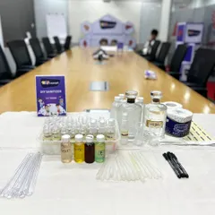 This conference table is ready for a DIY sanitizer making workshop. We provide all the materials and instructions for a fun, practical, and educational activity for corporate family days.