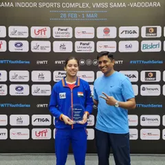 Our coach Ravindra Kotiyan with Ananya Chande at the WTT Youth Contender tournament. Direct mentorship from experienced national players is a core part of our high-performance program.