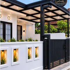 This carport design is attached directly to the home, featuring a grid-style frame with integrated lighting panels. The robust black steel structure complements the white exterior and gate, creating a cohesive and well-lit entryway that is both stylish and functional.