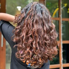 This client's hair looks absolutely stunning after her first proper curly routine. Her joy and confidence are the ultimate reward for me.
