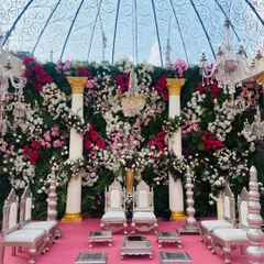 A closer look at the floral wall behind the mandap seating. I used a mix of roses, hydrangeas, and other blooms in varying shades of pink and white against a green backdrop to create a rich, textured, and romantic tapestry.