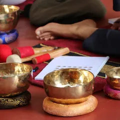 Sound is ancient medicine. This is a typical setup for my Sound Healing Teacher Training Course, with Tibetan bowls, mallets, and notebooks ready for the students to learn and practice.
