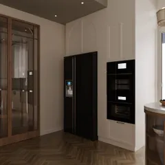 The kitchen design includes integrated appliances for a seamless look. An arch detail frames the built-in ovens, adding a soft architectural touch that connects with other elements in the home.