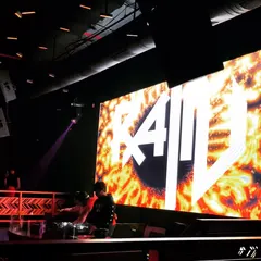 My logo lighting up the big screen behind the DJ console. This is the view from the stage when the whole club is locked into the music.
