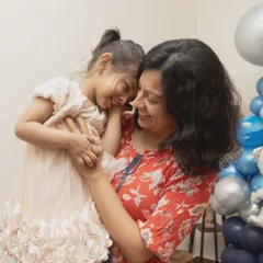A quiet, loving moment between a mother and her daughter amidst the party fun. I look for these connections to provide a balanced gallery of both high-energy and tender memories.