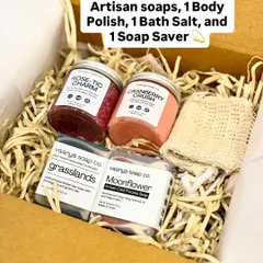 Here is a look inside one of our larger custom hampers. This set includes two artisan soaps, a body polish, a bath salt, and a natural soap saver, all nestled in eco-friendly shredded paper. We can create gift boxes like this for any budget or occasion.