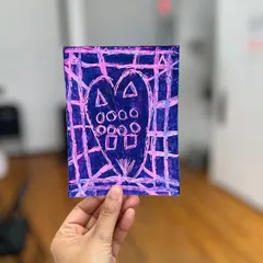 A young artist's creation using geometric shapes and patterns with the sgraffito oil pastel technique.