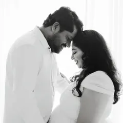 A timeless black and white portrait that strips away all distractions, focusing purely on the joy and intimacy shared between you and your partner.