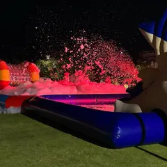 My foam machine in action during a night party. The foam fills the inflatable pool, creating a fun and safe play area for kids.