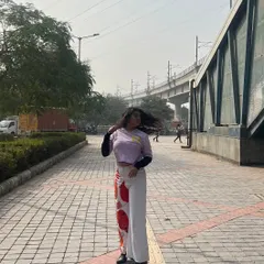 This is my take on abstract street style. I styled these custom-painted pants with a layered crop top for a casual, artistic look that’s perfect for a day out in the city.
