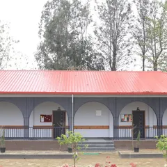 The completed UNACCO School building, demonstrating how the final construction faithfully realizes the vision presented in our architectural renders.