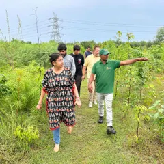 A family enjoying a walk through our Noida Sector 150 site after a plantation drive. We love it when multiple generations come together to connect with nature and contribute to a greener future.