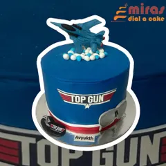 A high-flying cake for a Top Gun fan. This design features the movie's logo, a fighter jet topper, and cool aviator sunglasses, perfect for someone with a need for speed.