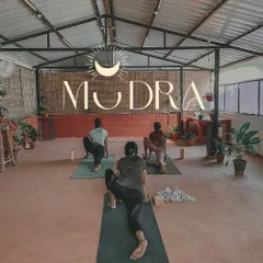 Welcome to Mudra, my rooftop yoga studio. This is a dedicated space for our community to practice, connect, and grow. The open air and serene environment make it the perfect place to find your focus.