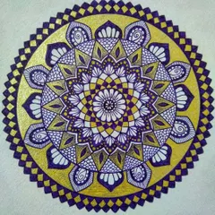 I love adding color to my mandalas. This piece uses a striking combination of deep violet and metallic gold to create a sense of energy and warmth. We explore how to use color effectively in some of my sessions.