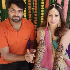 Posing with a popular Marathi actor after completing her stunning bridal-style mehandi for an event. Our team is experienced in working on film and television sets.