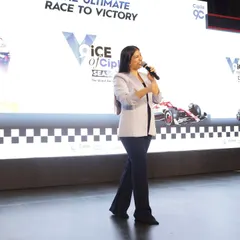 Walking the stage at the 'Voice of Cipla' event. I use the entire stage to maintain a dynamic presence and connect with all sections of the audience.