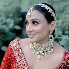 A happy bride is the most beautiful bride. Her smile here is everything, and I'm so glad I could create a look that made her feel this confident and radiant on her big day.