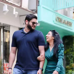 A playful and candid moment during a pre-wedding shoot in the city. I love capturing the real laughter and interactions that happen when a couple is just enjoying their time together.