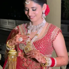 Every detail matters. Here you can see how the makeup complements the intricate details of her jewelry and the traditional kalire, creating a cohesive and stunning bridal portrait.