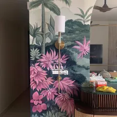 This angle highlights the rich colors and details of the foliage and flowers in this tropical wall painting. Each leaf and petal is hand-painted to contribute to the overall lush feel of the piece.