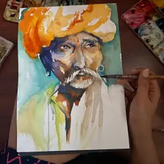 A quick watercolor sketch of a man in a vibrant orange turban. Capturing the essence of a person's character with just a few brushstrokes is a practice I truly enjoy.