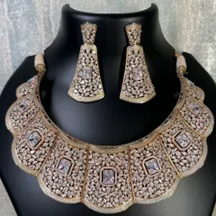 A clear image of the wide rose gold choker. The scalloped edge and detailed craftsmanship make this a premium party wear rental piece.