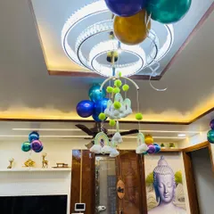 Another view of the ceiling decor, showing how a few strategically placed balloons can add a celebratory feel to the entire room.