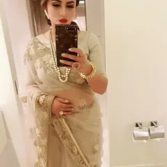 A classic beige and gold net saree is the epitome of grace. I styled this one with a string of pearls and a statement ring for a look that's perfect for a formal family function or elegant evening affair.