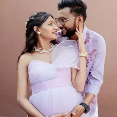An intimate couple's portrait in our lavender gown. The one-shoulder design with a modern, structured bow is a unique and fashionable choice.