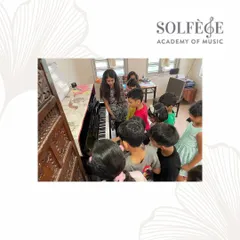 Curiosity is the first step in learning. I captured this moment during a music theory workshop where the children gathered around the piano, eager to see how the notes they learn on paper translate into sound. We encourage this hands-on exploration in our group piano classes.