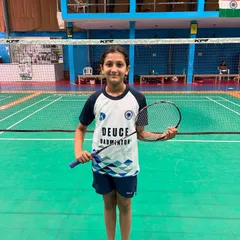 A young U11 girls' player, ready to represent Deuce Badminton Academy at the state level.