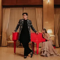 We had the pleasure of dressing YouTuber Triggered Insaan for a mehendi event in this custom black velvet Indowestern sherwani. The jacket features elaborate silver floral and paisley embroidery, creating a look of pure royalty.