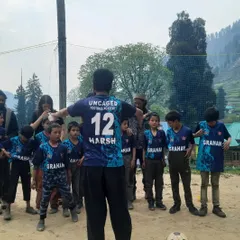 A view from my perspective as a coach. Facing the team, you can see the attention and eagerness of the young players. My own jersey shows how we are all part of the same team, learning and growing together.
