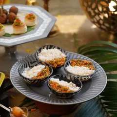 Here, my Payaru Paal Kanji is elegantly served and garnished with a generous pinch of Chammanthi Podi. The fiery, tangy powder cuts through the creamy rice and lentil broth, creating a perfectly balanced and sophisticated flavour experience for any occasion.