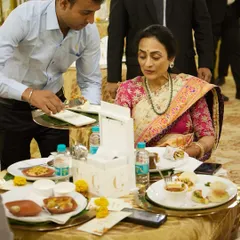 Our attentive staff ensuring a guest is well taken care of during a sit-down meal. We pride ourselves on providing seamless and personal service to every individual.
