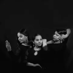 A promotional shot for 'Quest' featuring the three lead performers. The black and white photography captures the introspective and emotional depth of the stories we tell through dance.