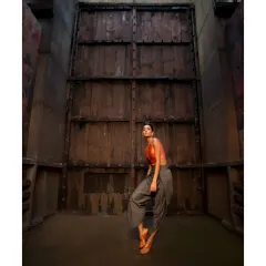 Only the best are always in motion. A dynamic shot of Lisa Haydon for a designer lookbook, set against a dramatic, industrial backdrop.
