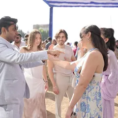 Engaging with guests during a wedding celebration. My close-up magic is interactive, encouraging participation and making everyone feel like they are part of the effect.