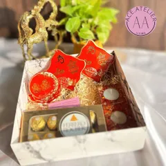 The vibrant red version of my festive hamper, perfect for adding a pop of color to Diwali celebrations. Each item, from the standee to the hangings, is handcrafted with intricate detail.