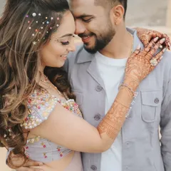 A beautiful couple shot where you can see the amazing henna stain. It looks so rich and complements the bride's outfit perfectly.
