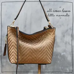 The beauty of our signature woven leather really shines in this All Woven Bronze Little Namrata. The metallic finish catches the light beautifully, adding a touch of glamour while the hand-weaving gives it a rich, unique texture.