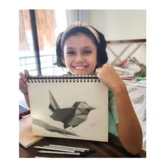 My wonderful 8-year-old student, Tavishi, proudly holding her finished drawing. It makes me so happy to see young artists learn with such enthusiasm and discipline.