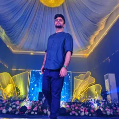 This is my office. On stage for a Sangeet night, ready to drop the beats that will make your family and friends dance all night. The lights, the decor, the energy, this is where the magic happens.